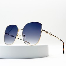 Gucci GG0879S Oversized Square Sunglasses Gold Frame Blue Gradient Lens picture