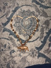 Vintage Hand-Carved Wooden Rhinoceros Pendant Beaded  picture