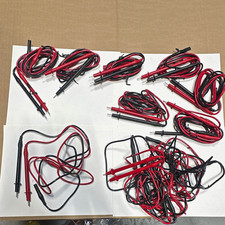 Lot of 11 Vintage Fluke multimeter leadset. New but have melted rubber on them. picture