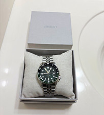 Seiko 5 Sports GMT Automatic Glow in the dark 42.5mm Green Dial Steel Bracelet picture