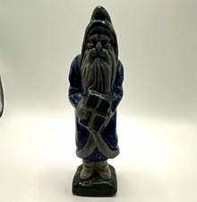 Santa Claus Blue Black Glazed Ceramic Figurine Holding Gift Box Christmas 1 Pack picture