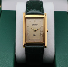 Vintage Seiko Slim Quartz Men's Wrist Watch Gold Dial with Green Strap. picture