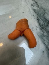 Unusual Shaped Baby Carrot.   Unique food.  Weird shaped food. picture