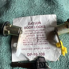 VINTAGE , Datsun Door Lock Pair  DP-16-108 MOST MODELS 1978-1982. OLD STOCK picture