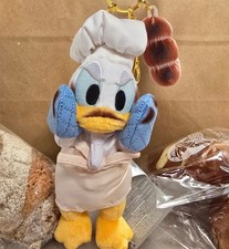 2026 Disney Parks Donald Duck Bakery Plush Keychain Holding Baguette picture