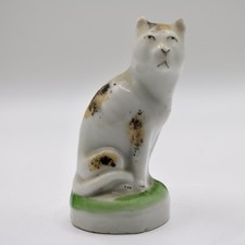 Antique Staffordshire Ceramic Cat Figurine Calico Seated Green Base 19thC picture