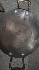 A small vintage round copper gratin dish with brass handles. picture