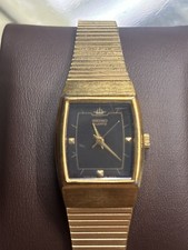 Vintage Seiko 8y21-5020 Unisex Watch Gold Toned with adjustable bracelet picture