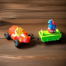 Hardee's 2001 Red Car Toy and Dairy Queen Green Trailer & Blue Dinosaur Toy 2002 picture