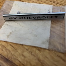 Original 1969 Chevelle Header Panel Emblem Badge Script BY CHEVROLET no. 3942788 picture
